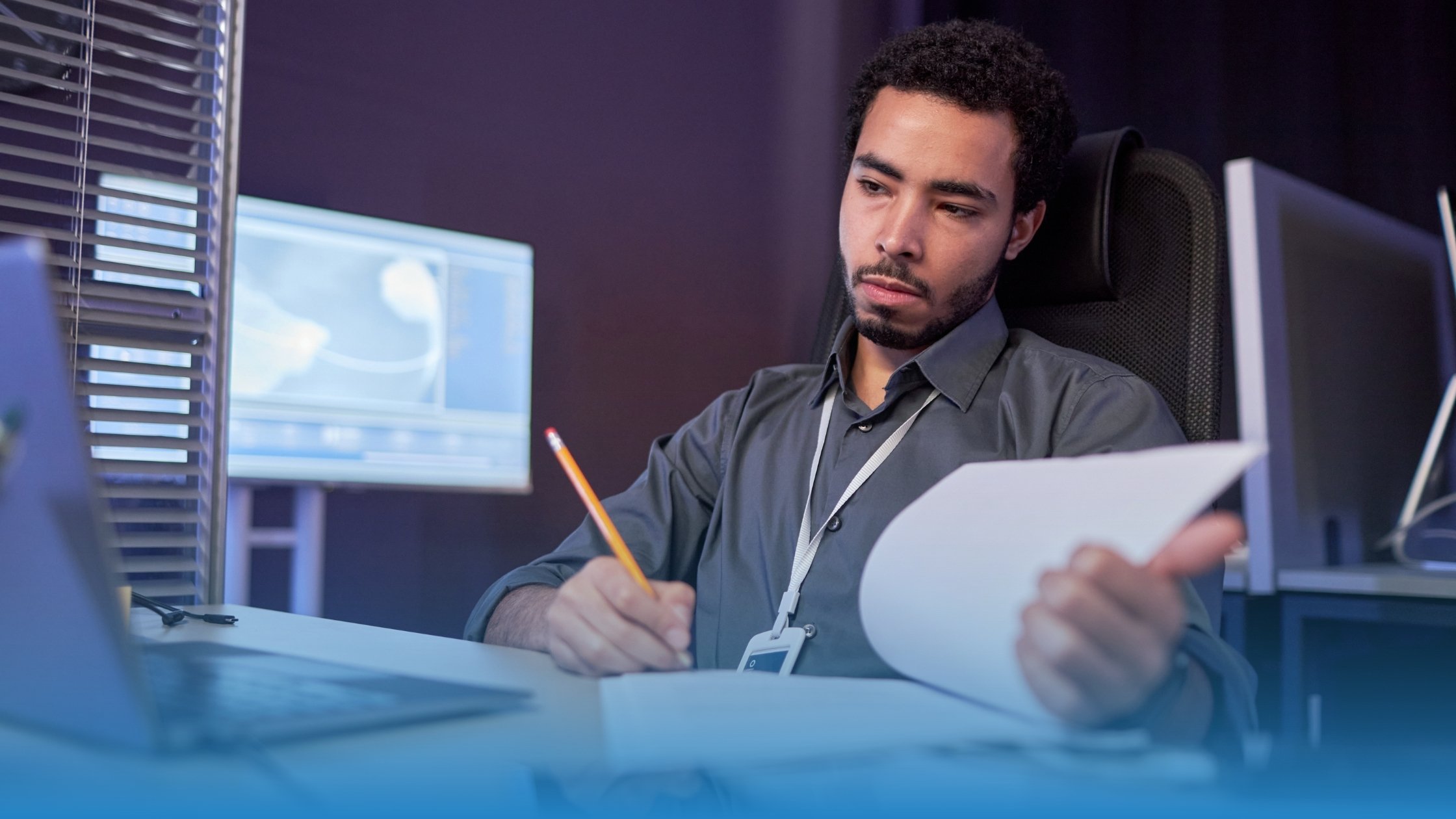 Professional reviewing a data privacy agreement at a computer, representing verified compliance through TermScout’s Certify™ DPA program.