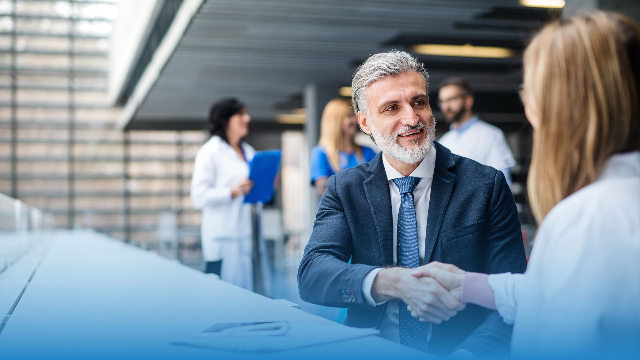 Two executives shaking hands after reviewing a verified DPA.