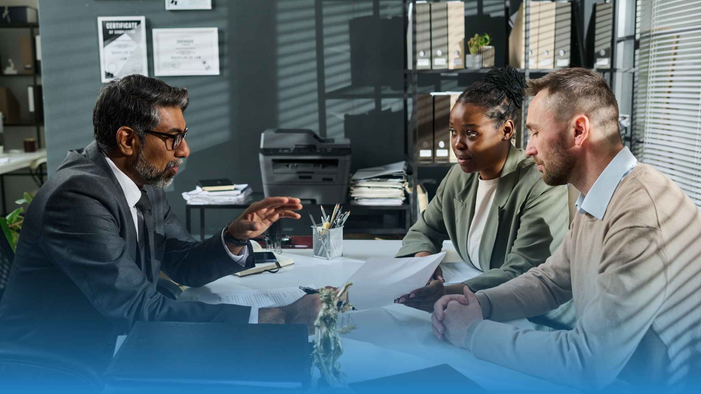 Legal and business professionals discussing New AI Deal Bottleneck in an office meeting.