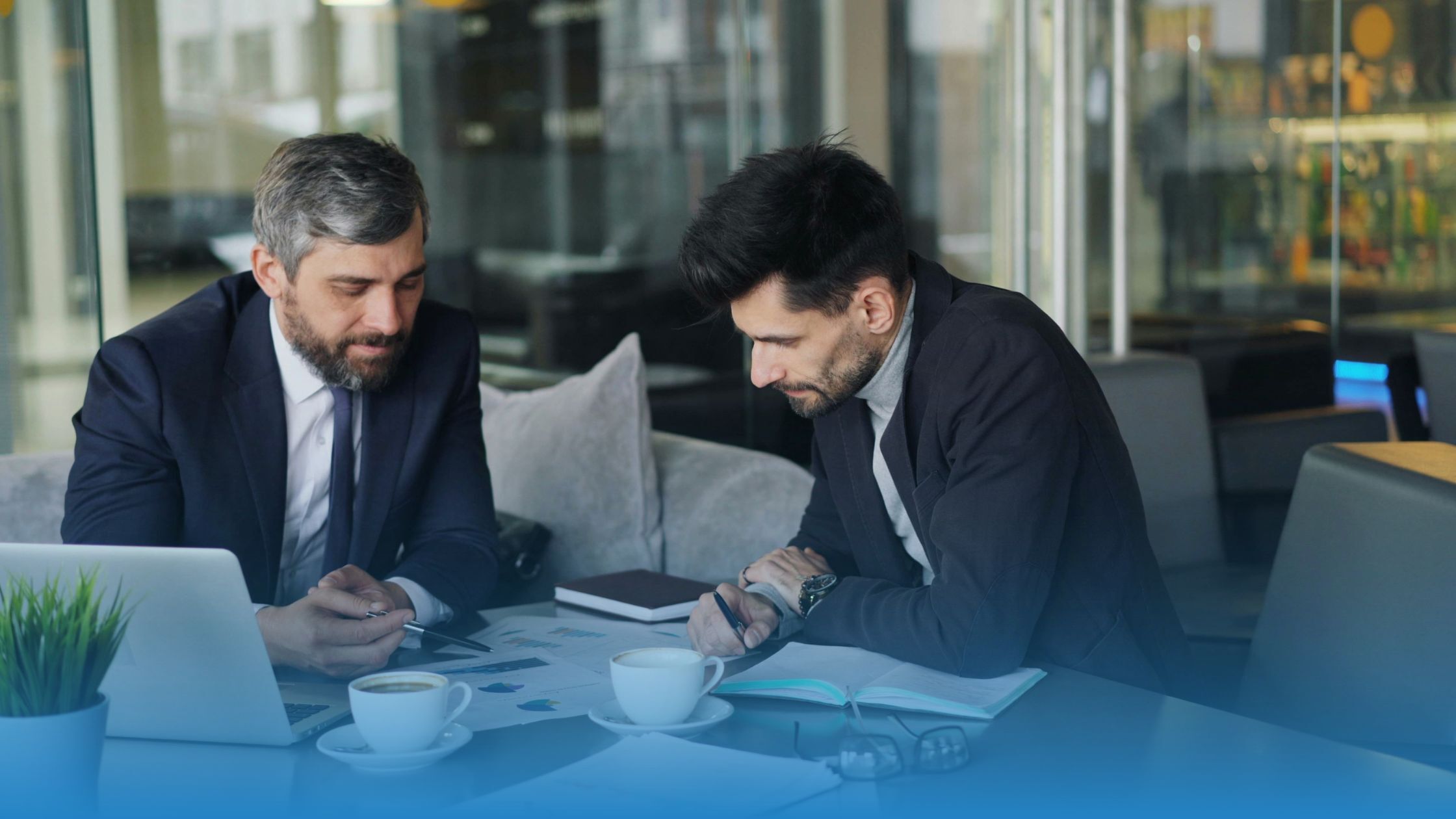 Two professionals discussing SLA agreement, highlighting transparency in customer contracts.