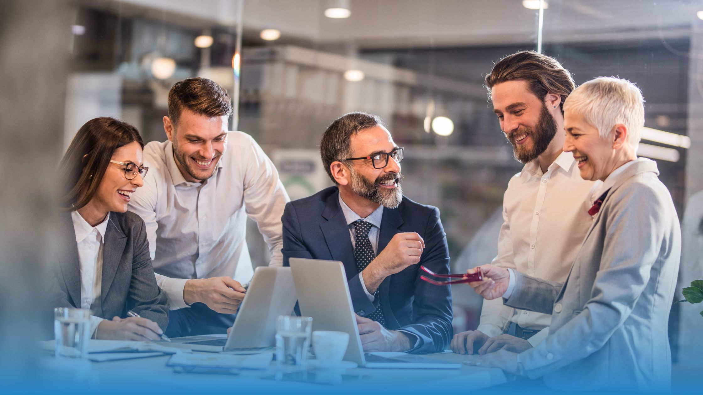 Legal operations team collaborating on contract strategy, expanding self-serve contracting from NDAs to procurement with TermScout.