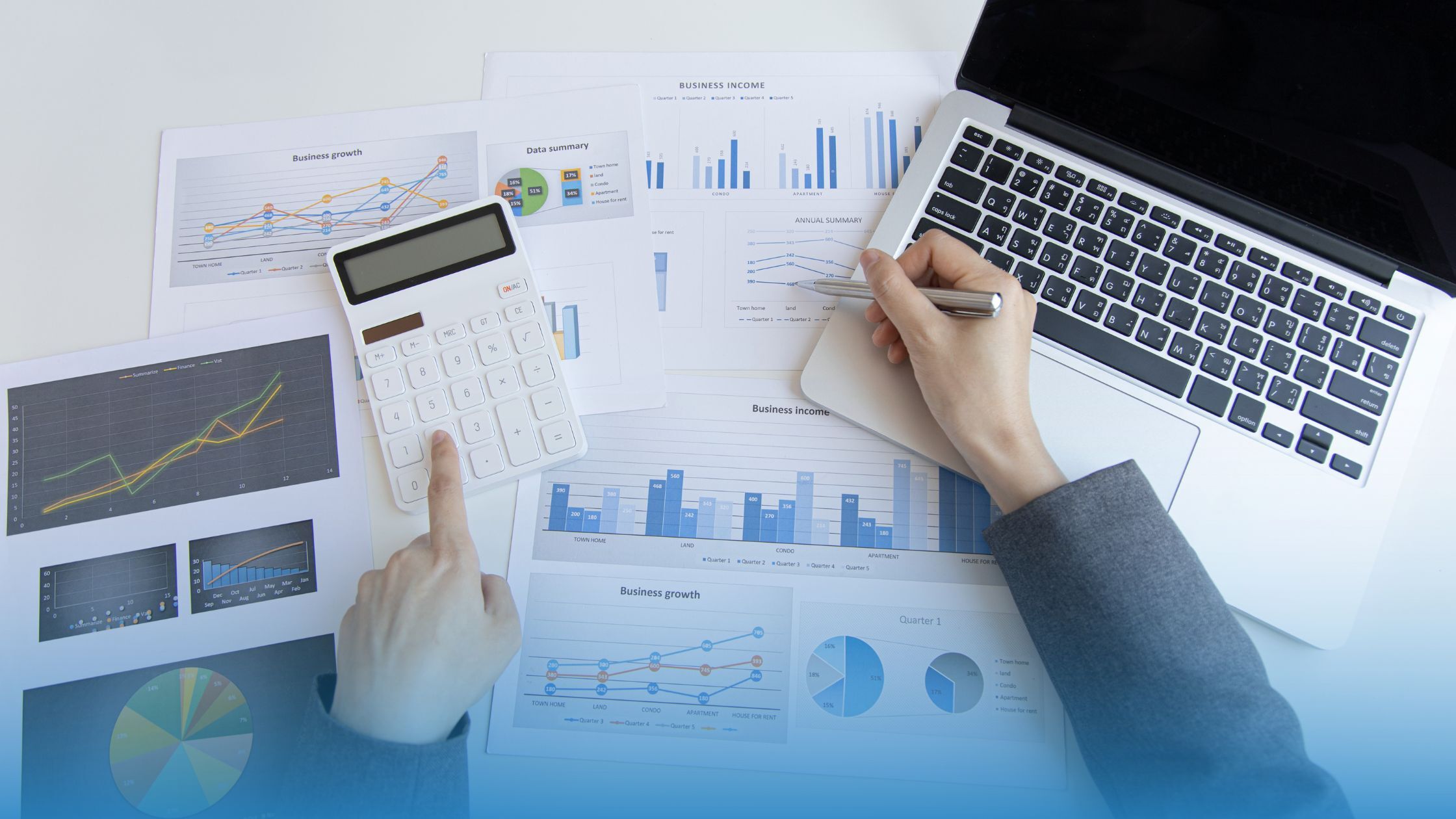 A finance professional reviewing finantial documents to accelerate revenue lifecycle management